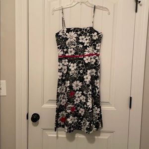 Black dress with white flowers.